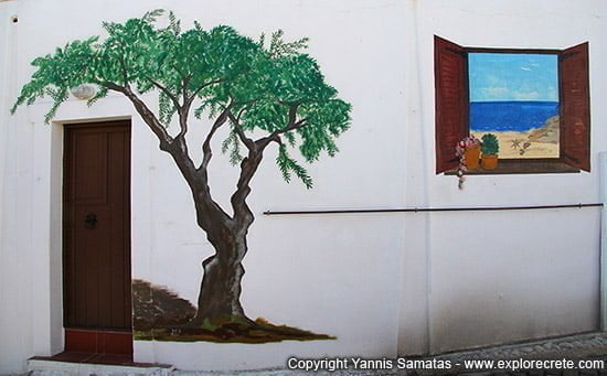 olive tree painted on the wall of a house in Koutouloufari
