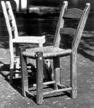 wooden chairs, photograph by donat john