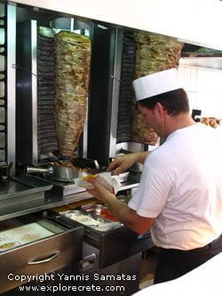 placing the gyros meat into the pita