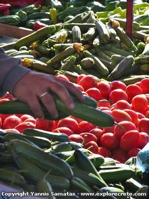 buying vegetables in laiki market in greece