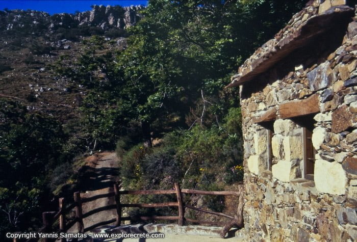 a stone house in milia